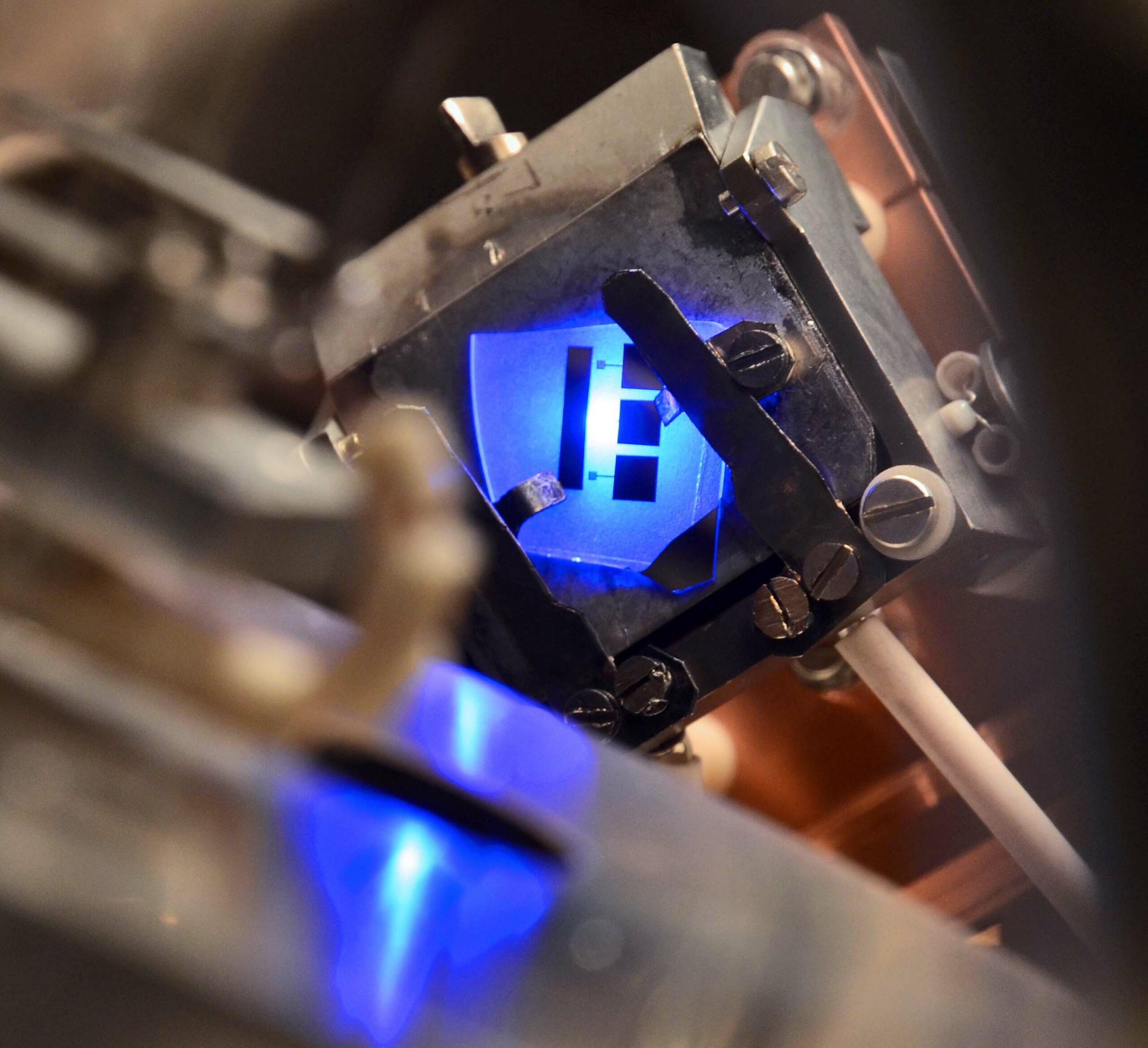 Simultaneous electron emission energy occurs when a LED light is under a ultra-high vacuum chamber.