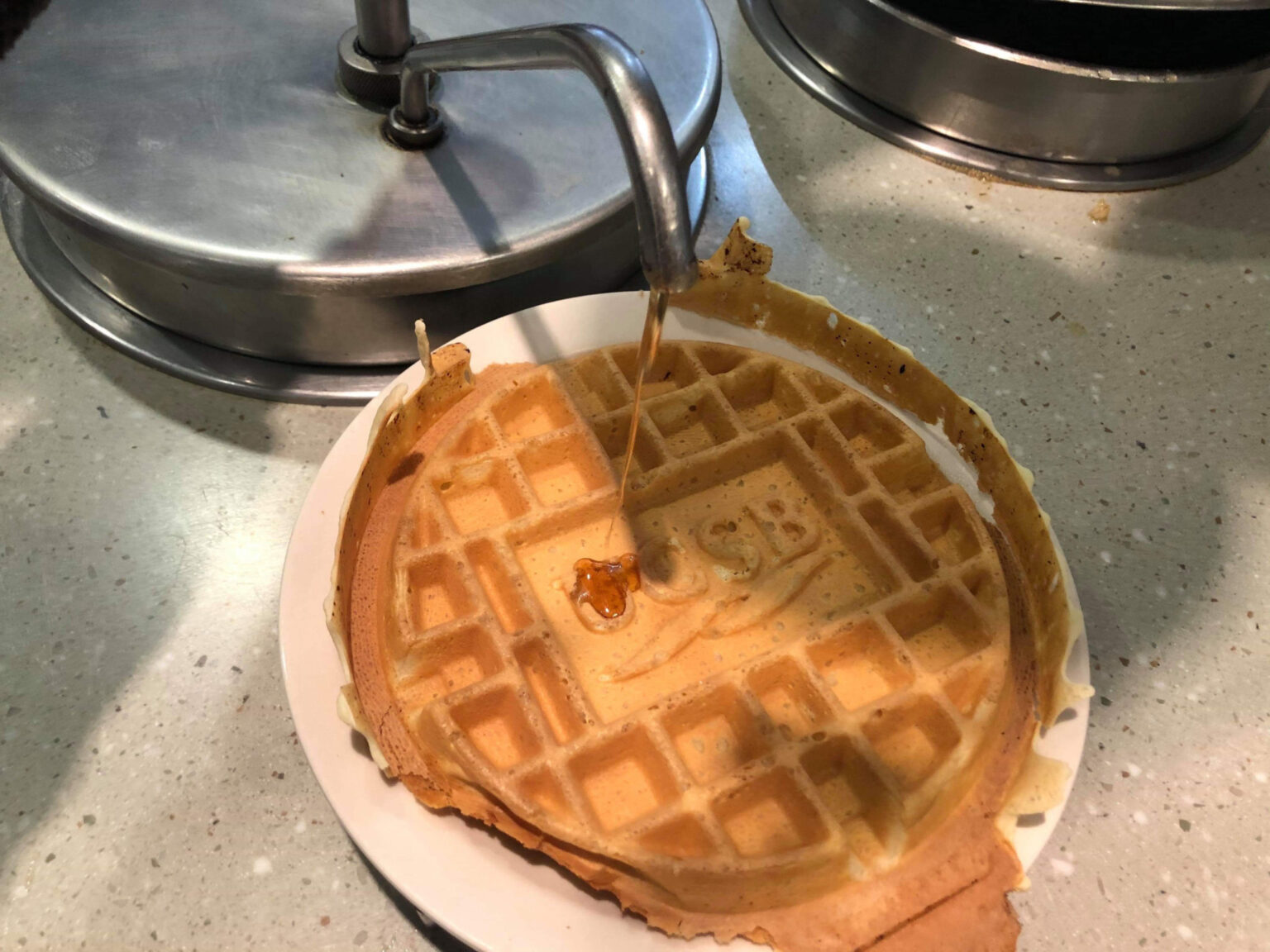 Excess Waffle Batter Oozing from Waffle Machine Reminder That You’re a