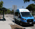 A “The Wave” van parking at the bus stop on El Colegio Road and Embarcadero del Mar, one of the pickup points for this microtransit service. Shengyu Zhang / Daily Nexus