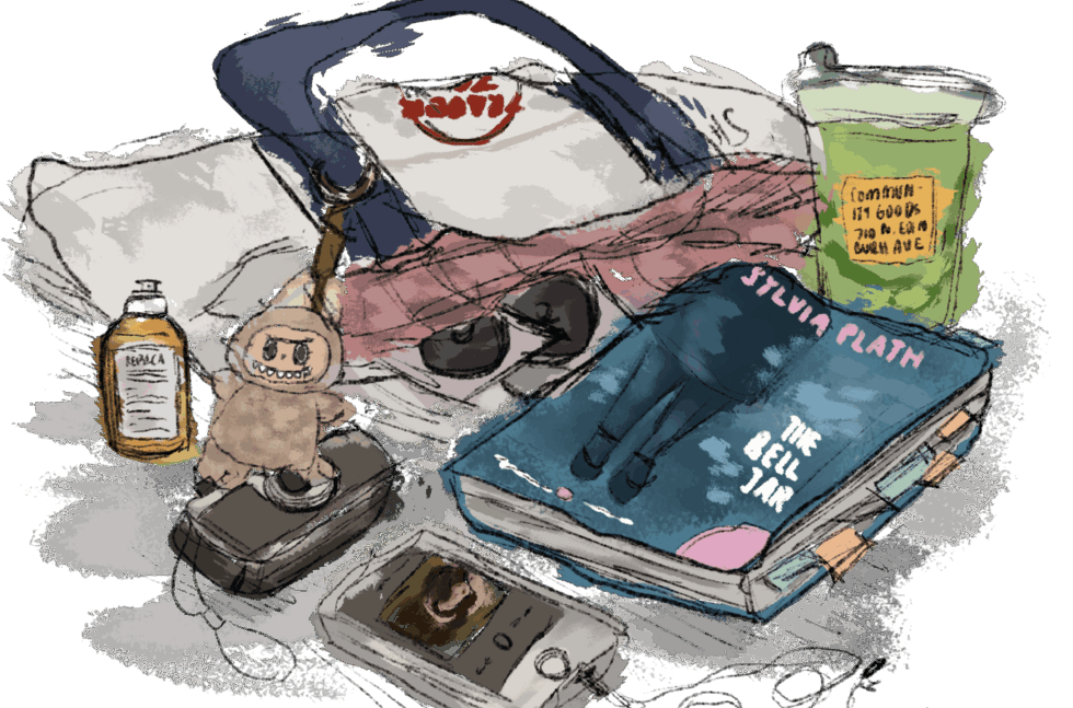 The performative male's ultimate accessories, spilling out of a Trader Joe's tote bag.